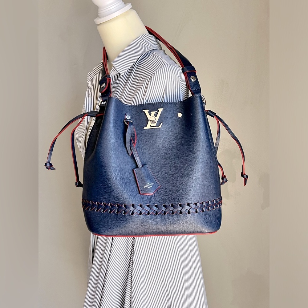 Rare Louis Vuitton LockMe Bucket Bag